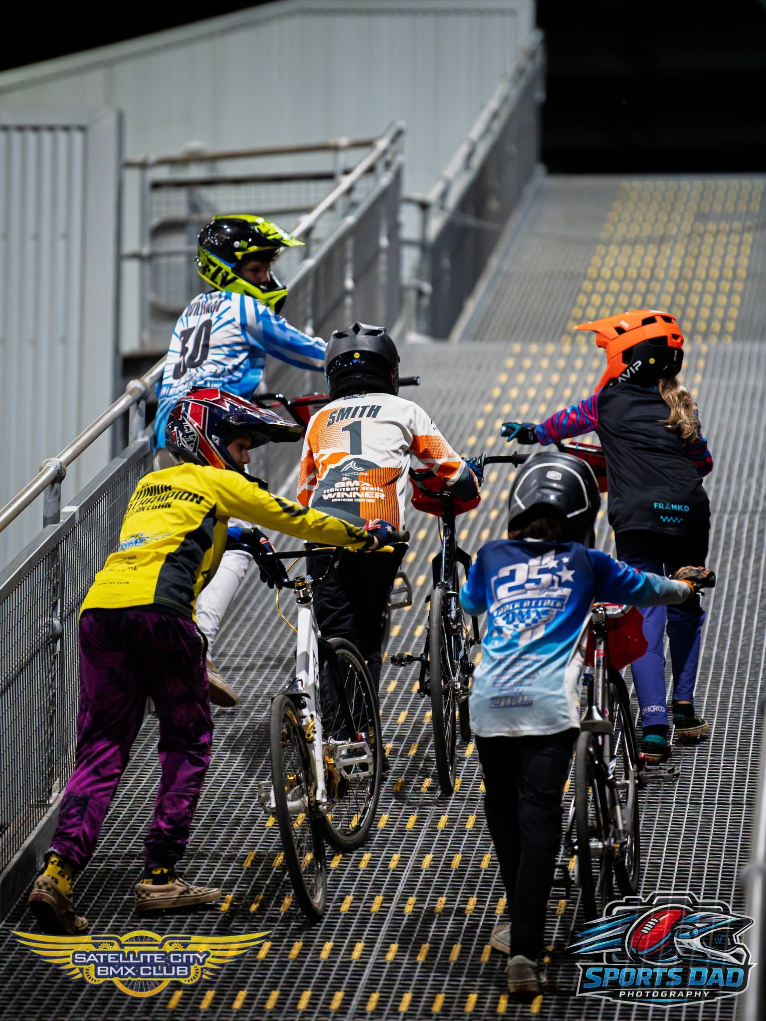 Young rider in JUST1 helmet and Big Rivers BMX Club jersey